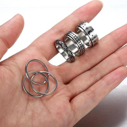 Vista 6 de Jstyle Juego de 4 anillos de acero inoxidable para mujeres y hombres, anillos giratorios de flores, luna, estrella, anillos frescos para aliviar