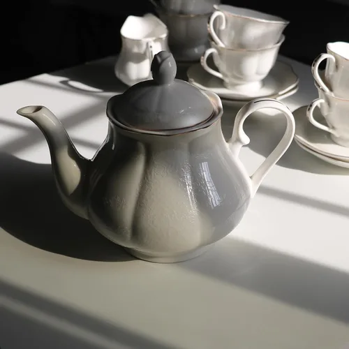 Vista 3 de GuangYang Juego de 15 piezas de té de porcelana para adultos, patrón blanco roto en relieve con ribete dorado