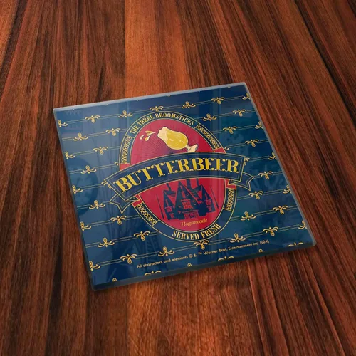 Vista 2 de Harry Potter – Logotipos de cerveza de mantequilla – Juego de cuatro posavasos de cristal de 4 x 4 pulgadas – Viene con un elegante posavasos