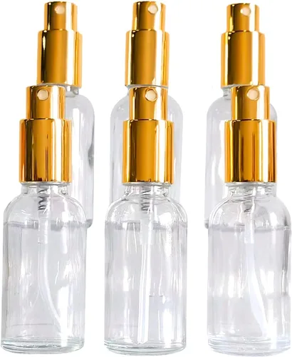 Vista 2 de Paquete de 12 botellas de vidrio transparente de 1 onza para aceites esenciales, botella de spray pequeña, aerosol de niebla fina, rociador dorado