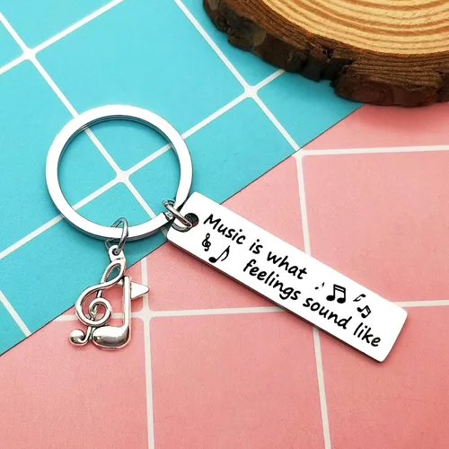 Vista 2 de Heigebi 6 llaveros de música, regalo para amantes de la música, regalos para hombres, mujeres, estudiantes, adolescentes, nota musical, llavero