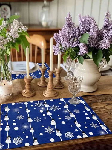 Vista 2 de Juego de 4 manteles individuales de Navidad de muñeco de nieve azul para mesa de comedor, juego de 4 manteles de tela impermeables, manteles Navidad