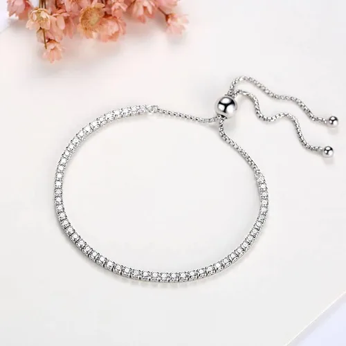 Vista 3 de Delicada pulsera de tenis de moissanita de oro de 18 quilates con diamantes completos de una sola fila y deslizador ajustable, regalo del día