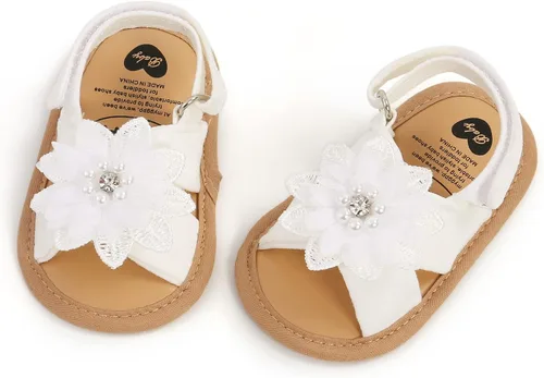 Vista 5 de GDSDYM Sandalias de verano para bebés y niñas con lazo de flores, suela suave, para vestido de boda, zapatos planos para recién nacidos, primeros