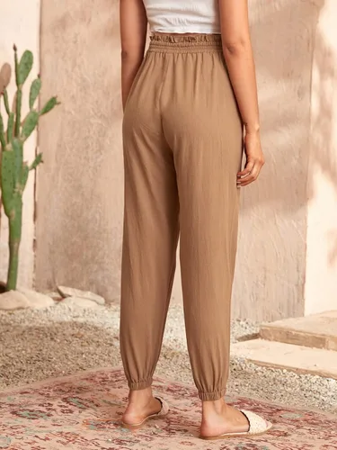 Vista 2 de OYOANGLE Pantalones de maternidad para mujer, de cintura alta, color liso, para trabajo, zanahoria, para embarazo, pantalones deportivos