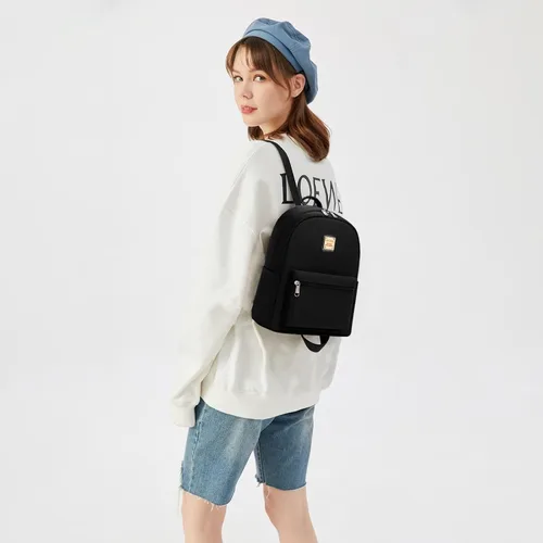 Vista 4 de Cusangel - Mochila pequeña resistente al agua para niñas, mochila pequeña para mujeres, niños, viajes escolares, Negro puro, Mochilas tipo mochila