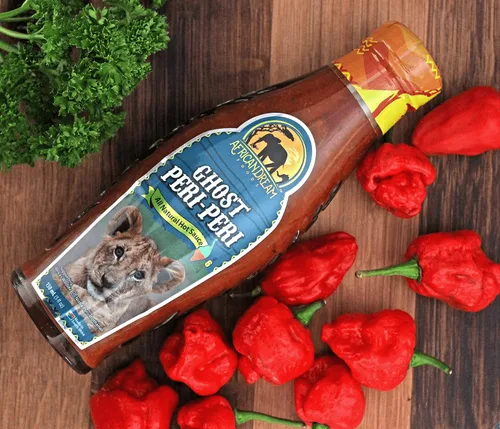 Vista 7 de Ghost Peri-Peri Salsa picante de African Dream Foods Salsa piri-piri picante totalmente natural con pimientos fantasma africanos Vegana, sin