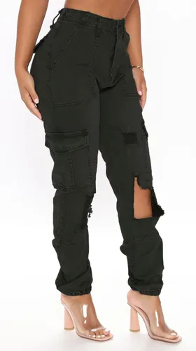 Vista 4 de Pantalones rotos acampanados para mujer con cintura elástica y dobladillo deshilachado