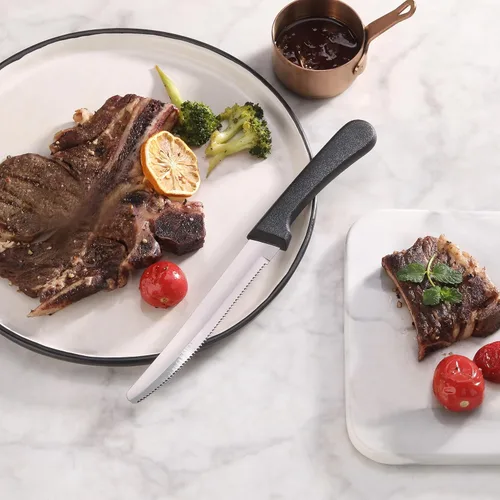 Vista 6 de New Star Foodservice Cuchillo para carne de acero inoxidable con mango de plástico, hoja dentada redondeada de 4.5 pulgadas, juego de 12