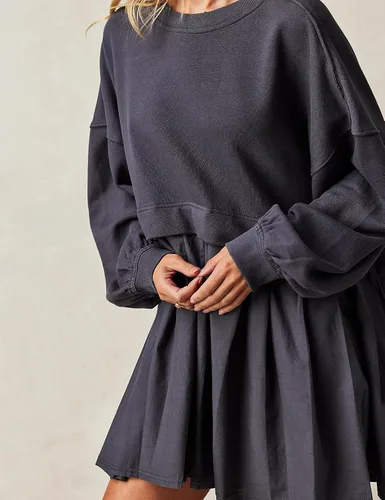 Vista 4 de Ugerlov Vestido de sudadera de gran tamaño para mujer, manga larga, cuello redondo, sin botones, ajuste relajado, mini vestido