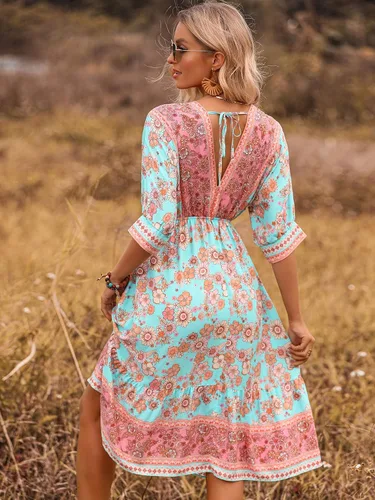 Vista 2 de OYOANGLE Vestido midi acampanado de media manga con cuello en V y estampado floral bohemio para mujer