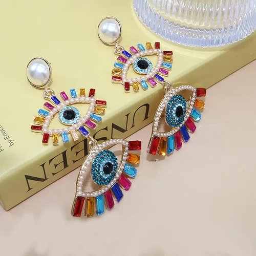 Vista 5 de Aretes colgantes de cristal para mujer, diseño de ojos malvados y divertidos, con diamantes de imitación abstractos y ojos colgantes, joyería