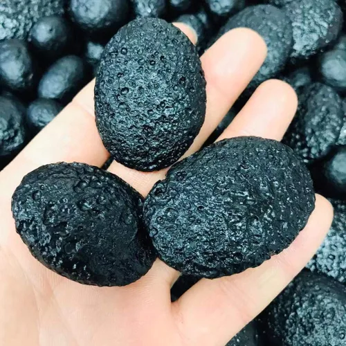 Vista 3 de 1pcs piedra natural natural meteorito cuarzo oval piedra áspera negro tektite espécimen para la venta