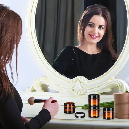 Vista 3 de Tanlade 100 tarros cosméticos de plástico ámbar de 2 onzas con tapas, recipientes vacíos a prueba de fugas, tarros cosméticos recargables herméticos