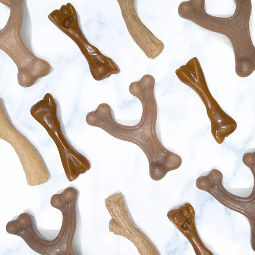 Vista 6 de Nylabone Juguete masticable fuerte de hueso de fémur gourmet para cachorros, juguetes calmantes para la dentición de cachorros, enriquecimiento