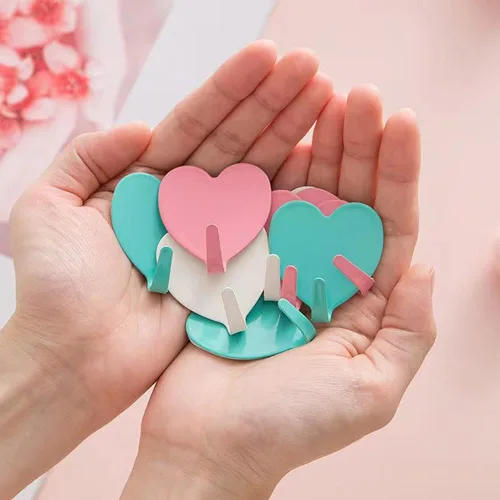 Vista 6 de JtmyAota Paquete de 6 ganchos decorativos de pared en forma de corazón, gancho de pared adhesivo fuerte de acero inoxidable para el hogar, cocina