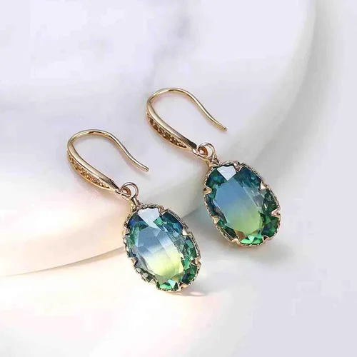 Vista 4 de Aretes colgantes de piedra preciosa de turmalina azul simple, aretes colgantes clásicos de oro brillante con circonita de cristal ovalado, joyería