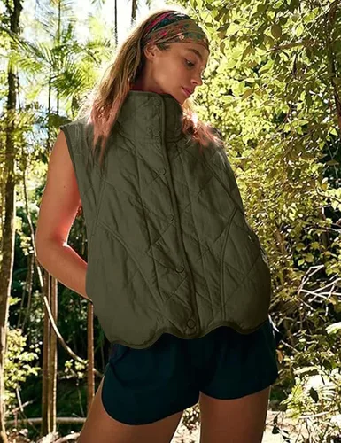 Vista 3 de COZYPOIN Chaleco acolchado ligero para mujer, sin mangas, cuello alto, con botones, acolchado con bolsillos