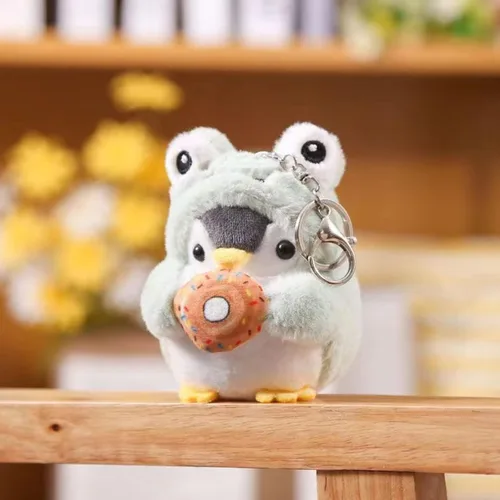 Vista 2 de Lindo llavero de pingüino Kawaii con diseño de pingüino de peluche para hombres, mujeres, niños. Colgantes de mochila..