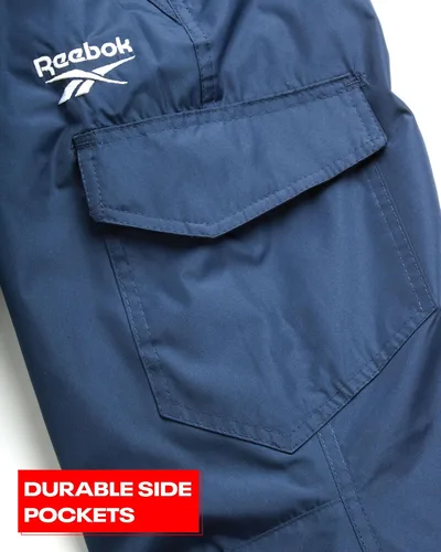 Vista 5 de Reebok Pantalones de nieve para niños Pantalones de snowboard pesados impermeables con bolsillos tipo cargo, polainas de nieve Pantalones de esquí