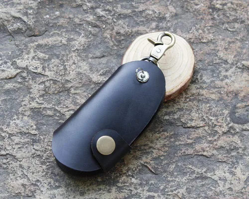 Vista 2 de Mejora la seguridad para evitar que se caiga de cuero genuino para llaves de puerta de coche, protector de llaves