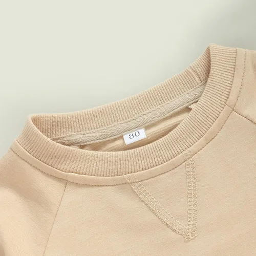 Vista 33 de Sudadera unisex de algodón de color sólido para bebé, camiseta de manga larga con cuello redondo