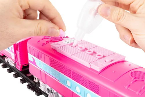 Vista 10 de Lionel Mattel Barbie - Juego de tren de juguete con control remoto, locomotora, vagones de tren y pista con sonidos auténticos de tren, luces