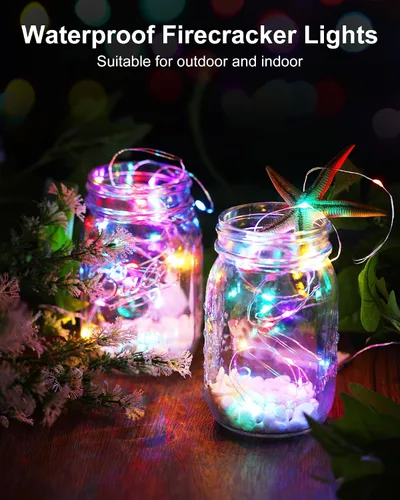 Vista 2 de Luces de hadas que funcionan con pilas, luces de cuerda centelleantes impermeables con cable plateado de 5 pies y 60 LED, luces de fuegos