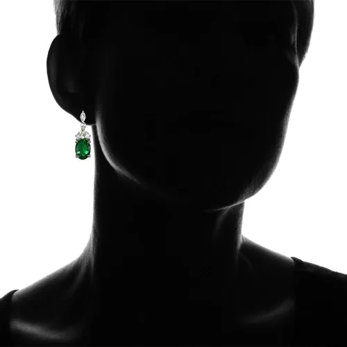 Vista 4 de Aretes colgantes ovalados de plata de ley con piedra natal genuina o creada y topacio blanco