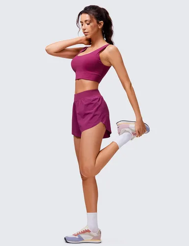 Vista 3 de CRZ YOGA Pantalones cortos de correr de delfín de cintura alta para mujer, de secado rápido, ligero, forro alto, pantalones cortos de entrenamiento