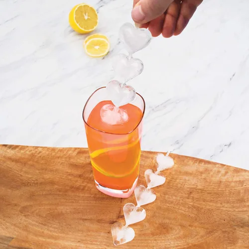 Vista 2 de Tovolo Heart Swizzle - Molde de hielo para agitador, tamaño Highball, silicona flexible, apto para lavavajillas