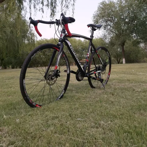 Vista 5 de EUROBIKE Bicicleta de carretera 700C Ruedas 19.3 in Marco para hombres y mujeres Bicicleta de carreras