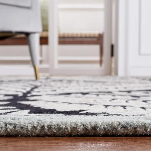 Vista 5 de SAFAVIEH Capri Collection - Alfombra de área de 9 x 12 pies, color negro y marfil, lana hecha a mano, ideal para zonas de alto tráfico en sala