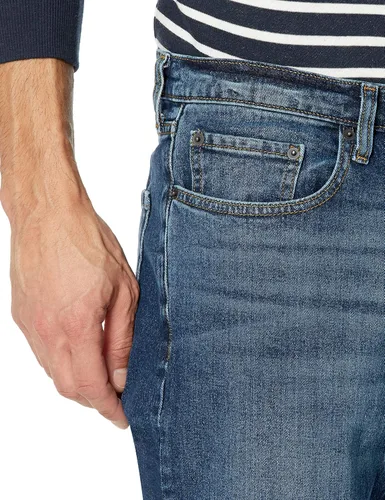 Vista 3 de Tienda Essentials - Jeans elásticos de ajuste atlético para hombre
