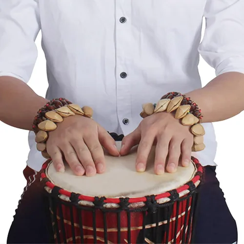 Vista 6 de Pulsera tobillera con sonajero de semillas de Cacho, 2 PCS pulsera africana shaker de cáscara de nuez, accesorios de percusión natural, instrumento