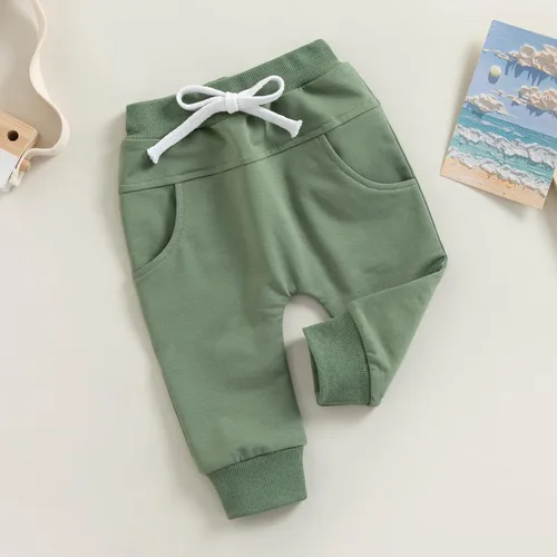 Vista 8 de Mubineo Pantalones deportivos básicos lisos para bebés, niños y niñas, cómodos pantalones de algodón con bolsillos
