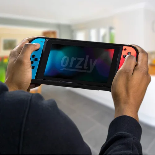 Vista 5 de Orzly Funda de agarre para Nintendo Switch - Cubierta trasera protectora para Nintendo Switch (modelo NO OLED) en modo de gamepad de mano