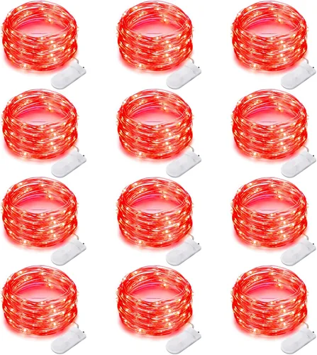 Vista 10 de Paquete de 12 luces de Halloween moradas que funcionan con pilas, luces de cadena de 7 pies, 20 luces LED de hadas, luces mini impermeables, cable