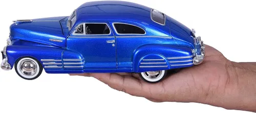 Vista 4 de Motormax 124 1948 Chevy Aerosedan Fleetline Vehículo (los colores pueden variar)