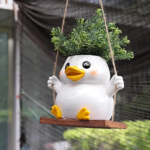 Vista 6 de Lindas macetas colgantes de pato oscilante para plantas de interior, macetas pequeñas para suculentas con orificio de drenaje, planta única