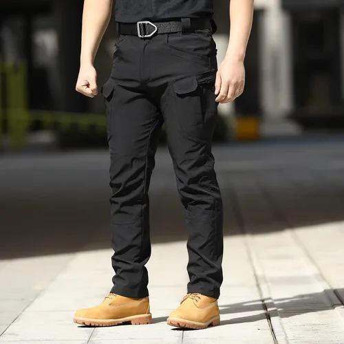 Vista 4 de Pantalones tácticos para hombre, resistentes al agua, Flex Ripstop Cargo Pantalones ligeros de senderismo con múltiples bolsillos (sin cinturón)