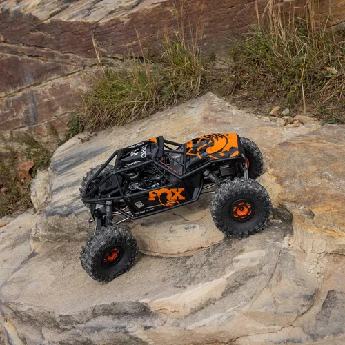 Vista 3 de Axial RC Crawler 1/10 UTB10 Capra 1.9 4WS 4X4 RTR Crawler de roca con cepillo, naranja, AXI-1543T1