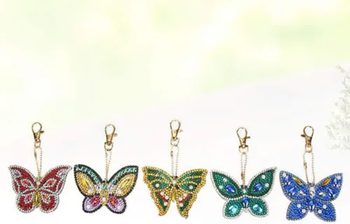 Vista 5 de EXCEART Llaveros de pintura con diamantes de imitación de mariposa bolso colgante para niñas y mujeres abalorio de teléfono 5 piezas