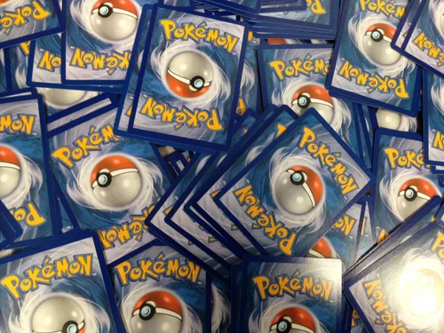 Vista 2 de 50 tarjetas de Pokemon surtidas con láminas holográficas de bonificación