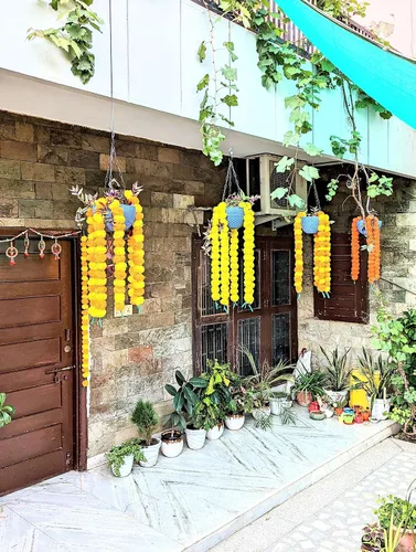 Vista 5 de Pretty Charming Flores artificiales de caléndula para decoración guirnaldas largas de caléndula para Toran Indian genda phool para bodas
