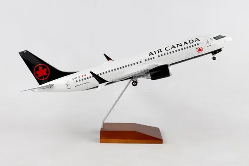 Vista 4 de Daron Skymarks Air Canada 737MAX8 1/100 con soporte de madera y engranaje