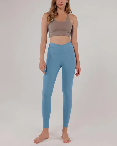 Vista 4 de ODODOS - Leggings de cintura cruzada para mujer, diseño con bolsillo interno, para yoga, deportes, gimnasia o entrenamiento, pantalones deportivos