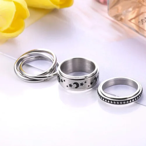 Vista 6 de CASSIECA Anillos giratorios de acero inoxidable para mujeres y hombres anillos giratorios de flores luna estrella anillos de ansiedad frescos