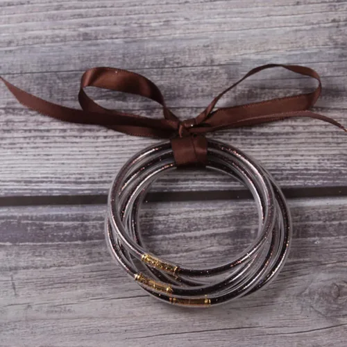 Vista 2 de Caiyao Pulseras rellenas de cuentas de gelatina ligeras y coloridas pulseras de silicona apilables con lazo, bonitas joyas brillantes para mujeres