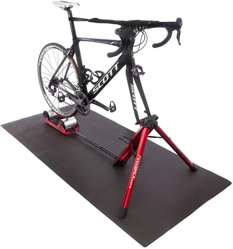 Vista 2 de FEEDBACK SPORTS Alfombrilla de entrenamiento de bicicleta Superficie antideslizante, segura para tacos de ciclismo Colocar debajo